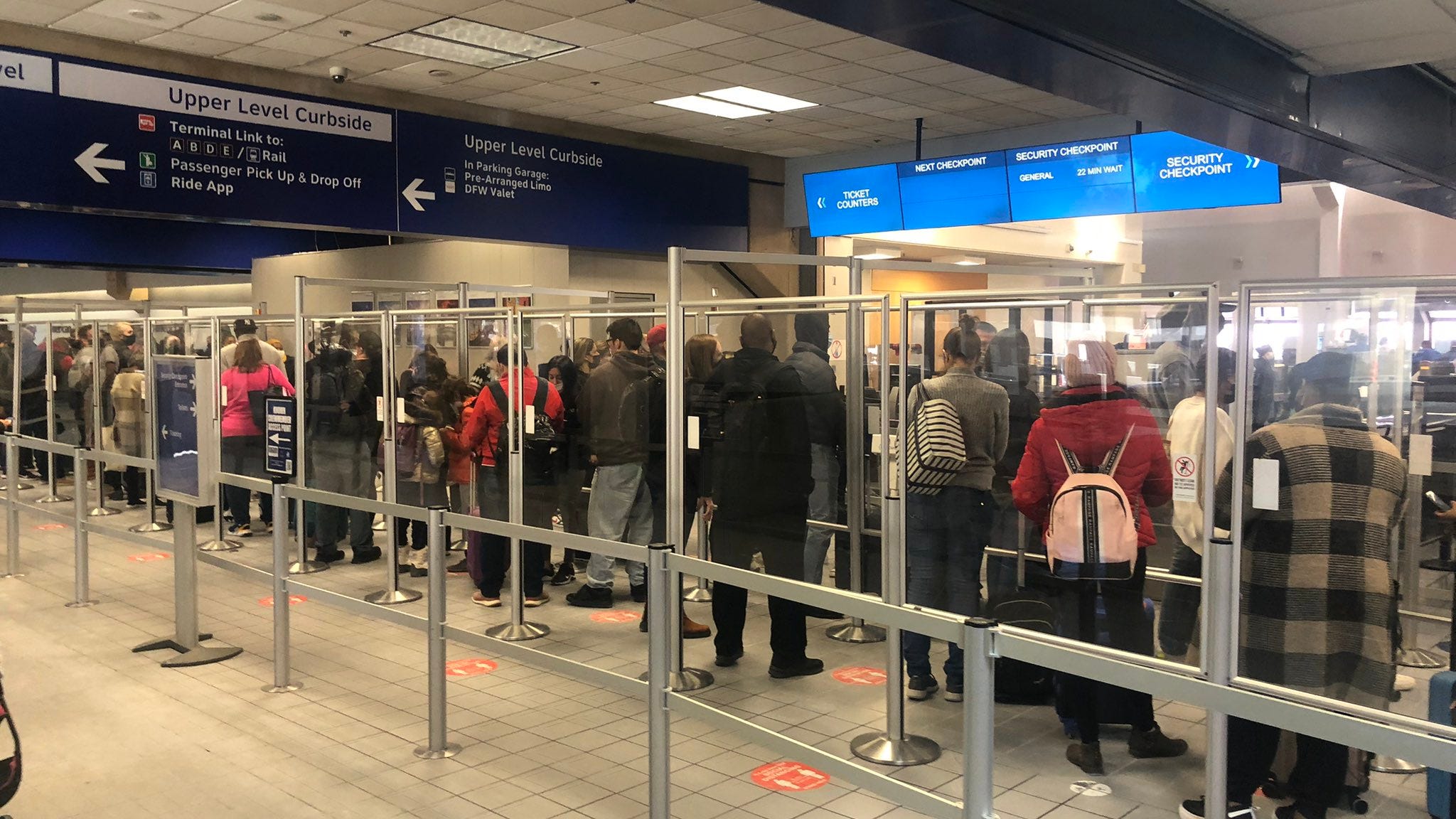 Passengers find long line at security as traffic returns to DFW Airport