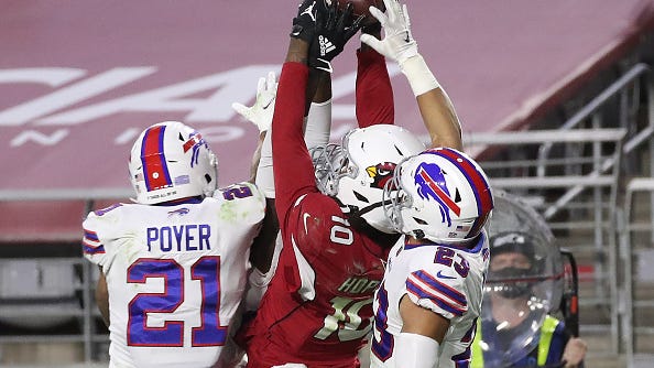 Murray-Hopkins Hail Mary finish to beat Bills leaves fans in awe: 'Greatest catch of all time?'