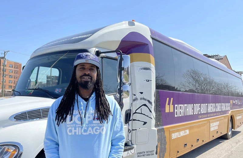 Dilla Thomas in front of tour bus