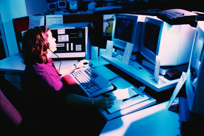 Woman working at a dispatch terminal