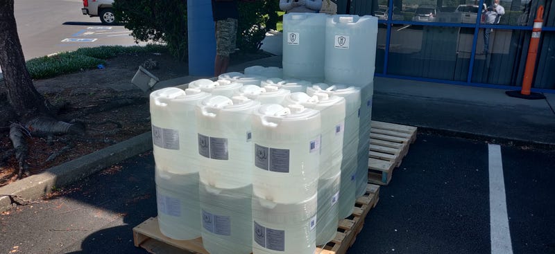 Containers of hand sanitizer sit ready for delivery at Loch and Union Distilling in American Canyon