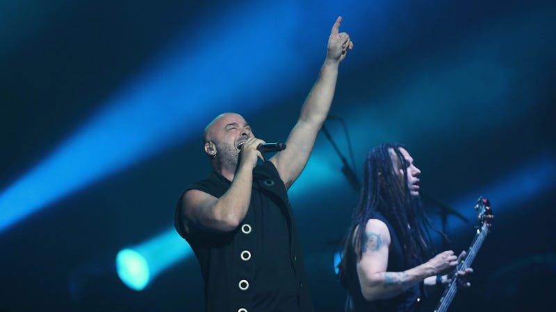 Singer David Draiman (L) and bassist John Moyer of Disturbed perform at T-Mobile Arena on January 12, 2019 in Las Vegas, Nevada. 