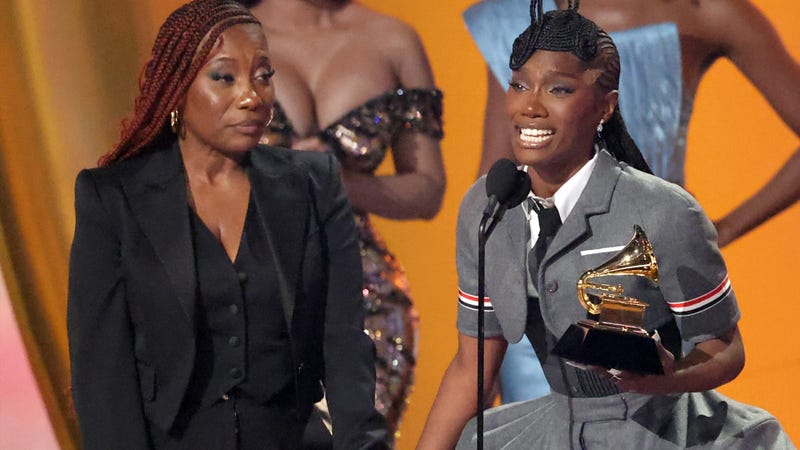 Doechii accepts the Best Rap Album award for "Alligator Bites Never Heal" from Cardi B onstage during the 67th GRAMMY Awards at Crypto.com Arena on February 02, 2025 in Los Angeles, California. 