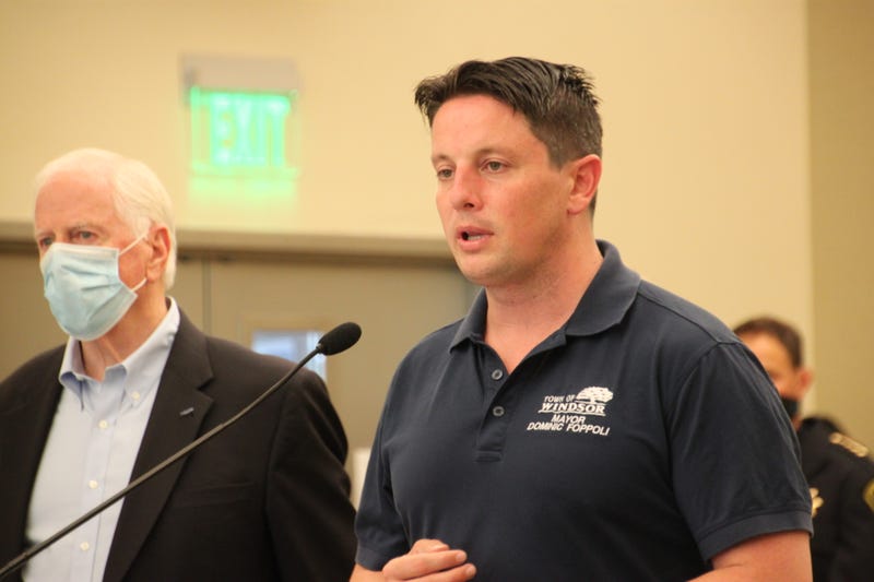 Former Windsor Mayor Dominic Foppoli speaking at a press briefing.