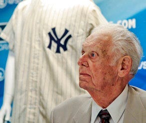 FILE - In this June 28, 2012, file photo, New York Yankees great Don Larsen reacts during a news conference announcing the auction of his 1956 perfect game uniform, in New York. (AP Photo/Bebeto Matthews, File)