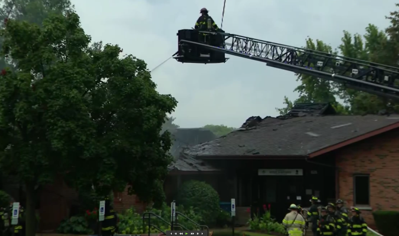 Firefighters work to put out a fire at Good Shepherd Lutheran Church in Downers Grove.