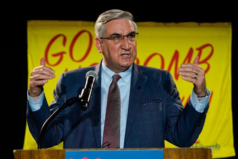 Indiana Gov. Eric Holcomb addresses supporters after winning his second term as governor in Indianapolis, Tuesday, Nov. 3, 2020. 