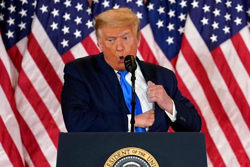 President Donald Trump speaks in the East Room of the White House, early Wednesday, Nov. 4, 2020, in Washington