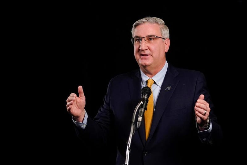 Indiana Republican Gov. Eric Holcomb participates in the Indiana Gubernatorial debate with Democrat Woody Myers and Libertarian Donald Rainwater, Tuesday, Oct. 27, 2020, in Indianapolis. The candidates were in separate studios to allow for social distancing guidelines.