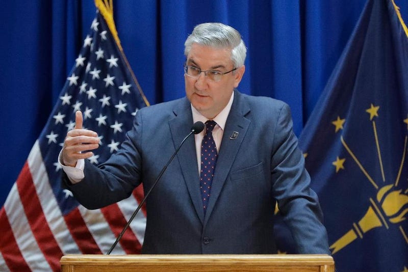 Indiana Gov. Eric Holcomb speaks during a news conference at the Statehouse, Thursday, March 19, 2020, in Indianapolis.