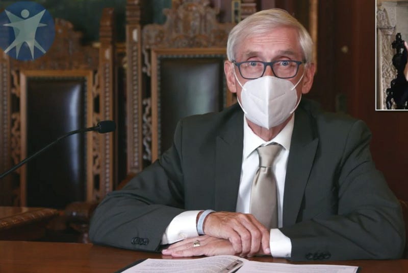 This July 30, 2020 image taken from video by the Wisconsin Department of Health Services shows Wisconsin Gov. Tony Evers in Madison, Wis. 