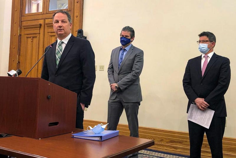 Indiana House Speaker Todd Huston, R-Fishers, speaks during a news conference at the Indiana Statehouse in Indianapolis, Thursday, April 15, 2021, with Indiana Senate Appropriations Committee Chairman Ryan Mishler, R-Bremen, center, and Senate President Pro Tem Rodric Bray, R-Martinsville. A new state revenue report given Thursday to legislators projects tax collections will bounce back stronger than expected from the pandemic recession.