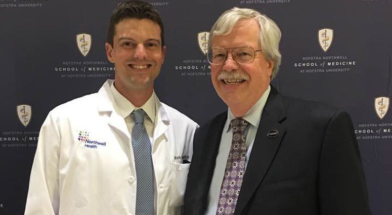 Mark Hamilton with his father