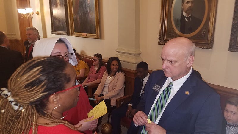 Atlanta OB-GYN Dr. Hedwige Saint-Lewis (r) is shown trying to convince Senator Brandon Beach to vote against the "Heartbeat Bill".