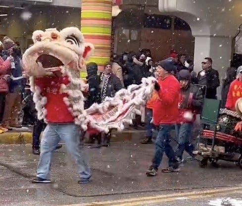 Dragon costume on snowy street in Chicago