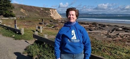Cicely Muldoun, superintendent of the Point Reyes National Seashore, stands in front of Drakes Beach, where about 50 beached elephant seals have arrived for pupping season.