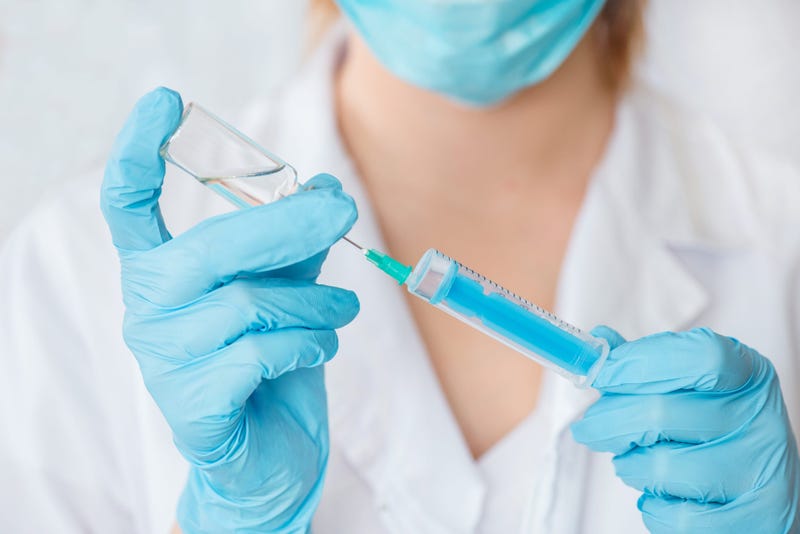 Nurse with needle