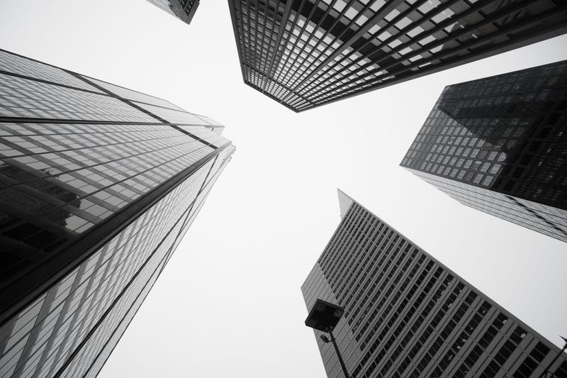 Black and white image towering Architecture and cityscapes of five Chicago buildings rising skyward Illinois USA