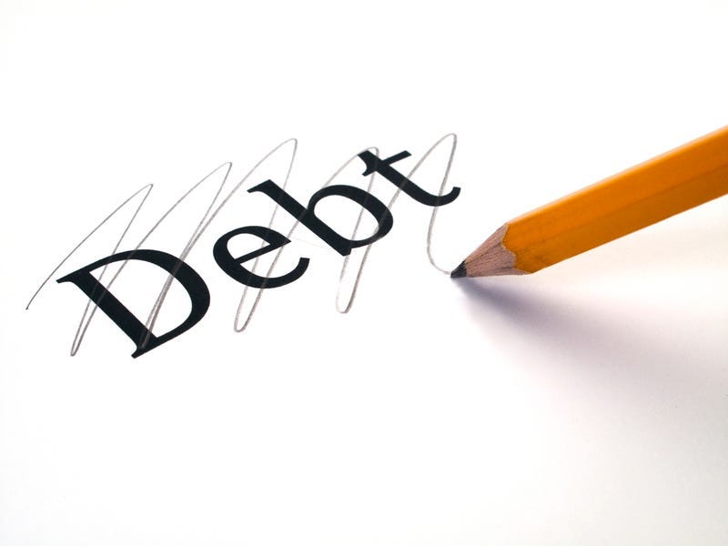 The word debt marked through, yellow pencil