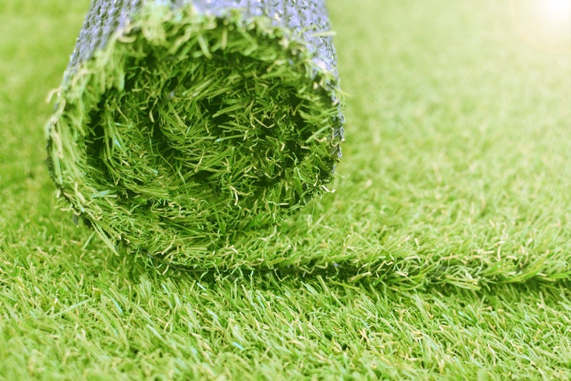 Artificial turf roll. Synthetic grass 
