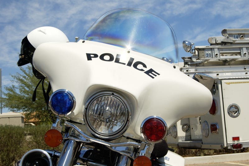 Police motorcycle on display at a fundraising event.
