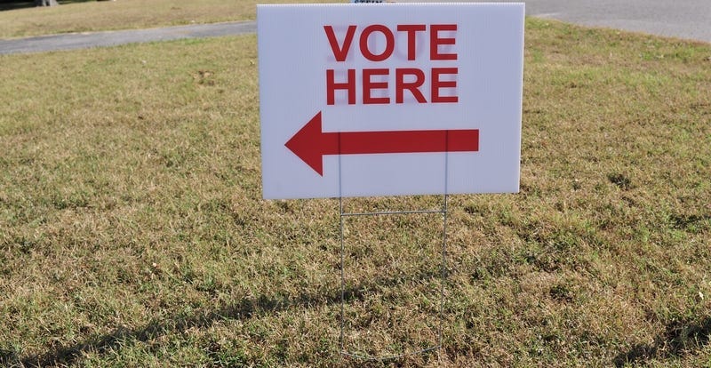 Vote here sign