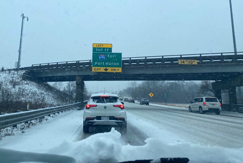 Waiting in line to merge onto I-696 in Southfield during a winter storm