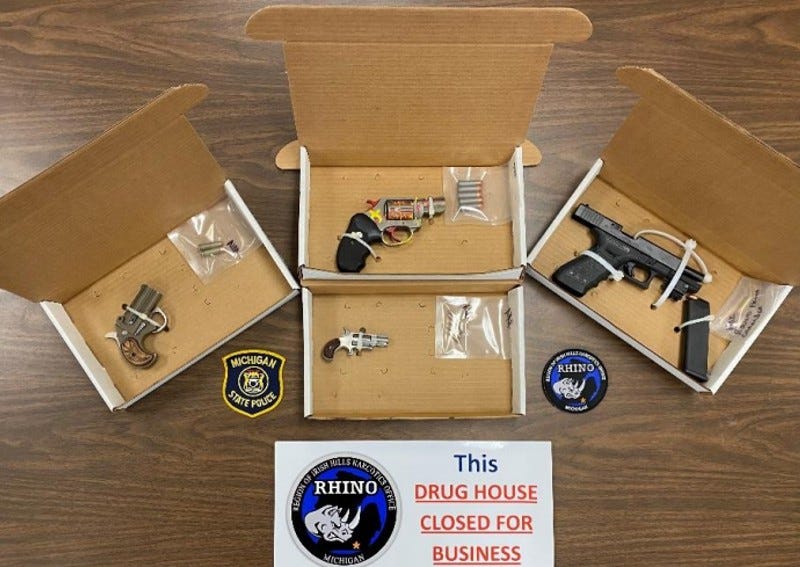 Guns seized in Hilldale County on April 7, 2022.