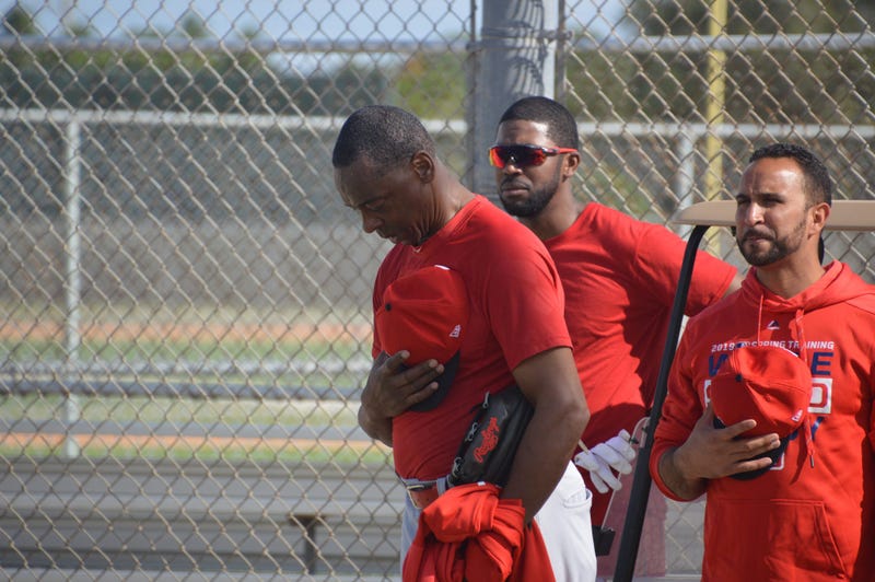Willie McGee stands in moment of silence