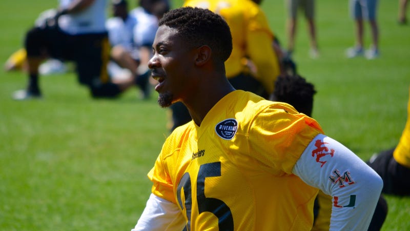 Steelers CB Artie Burns stretches during the team's OTA