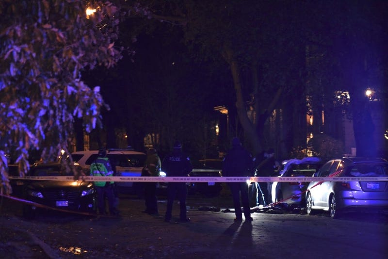 Police investigate after a woman was found dead in a burning car Nov. 22, 2019, in the 1400 block of West Farragut Avenue. 