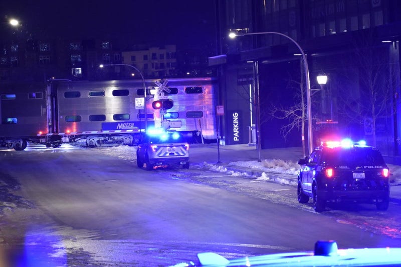 Authorities investigate the scene where a Metra train struck a car Jan. 19, 2020 in West Town.