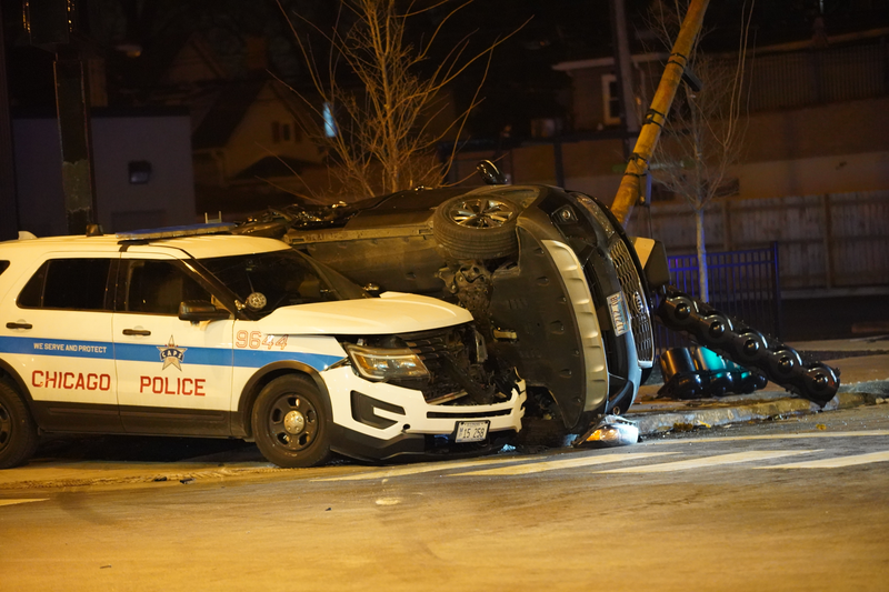 The wreckage of a crash between a Chicago police cruiser and a Kia sedan at the corner of Lawrence and Central avenues Dec. 18, 2019.