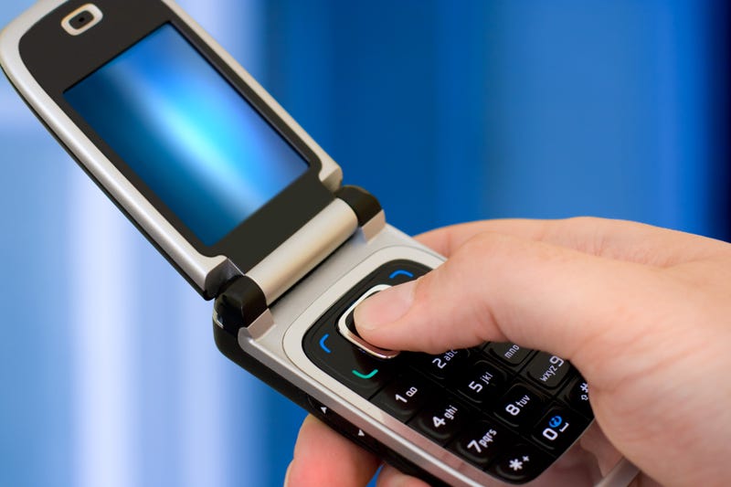 dumbphone in palm
