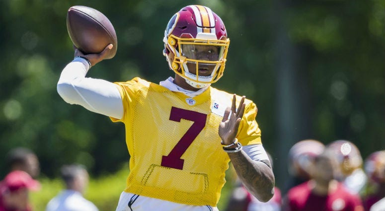 Redskins QB Dwayne Haskins throws a pass during minicamp.
