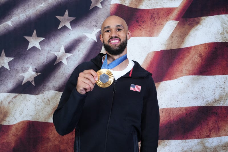 Derrick White with his 2024 Olympic gold medal.