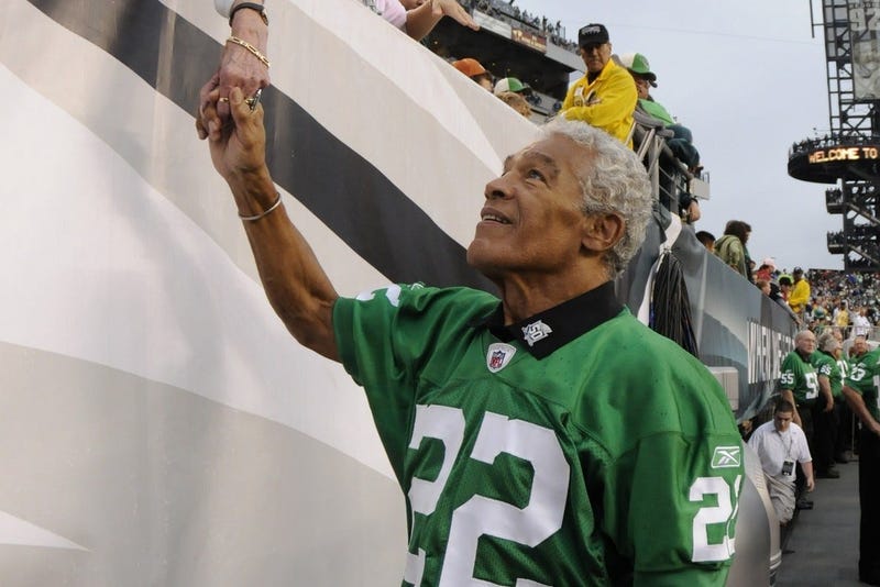 Timmy Brown shakes hands with fans after a ceremony honoring the 1960 NFL Championship team at Lincoln Financial Field.