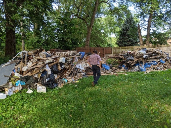 A Ring doorbell camera caught two men emptying the contents of a dump truck - much of it appearing to be construction debris - in a lot near 58th and Wood in the West Englewood neighborhood overnight Monday into Tuesday.