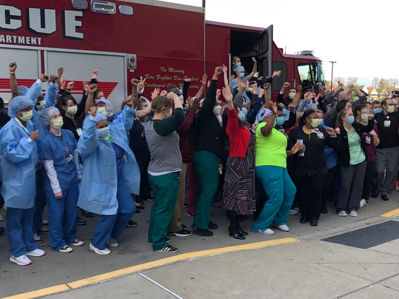 Nurses saluted by Buffalo Police and Fire Departments outside ECMC/WBEN Photo by Brendan Keany