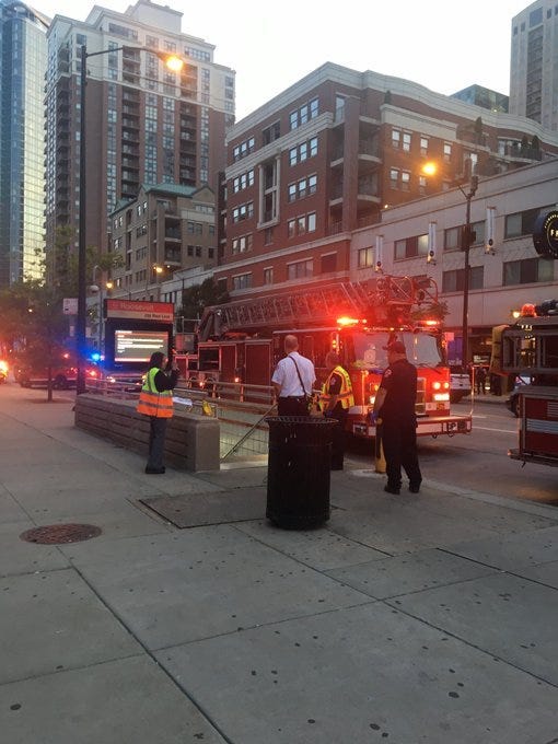 Red Line trains are being diverted Friday after a person was fatally struck by a train, and two others were injured in the South Loop, authorities said.