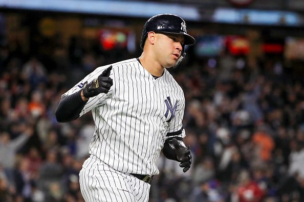 Gary Sanchez acknowledges the Yankees dugout after homering. 