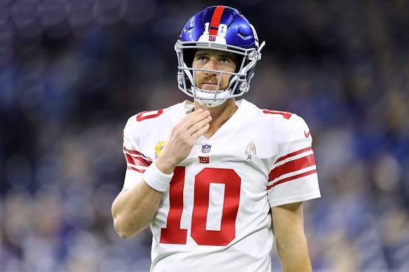 Eli Manning looks up at the scoreboard during a Giants preseason game. 