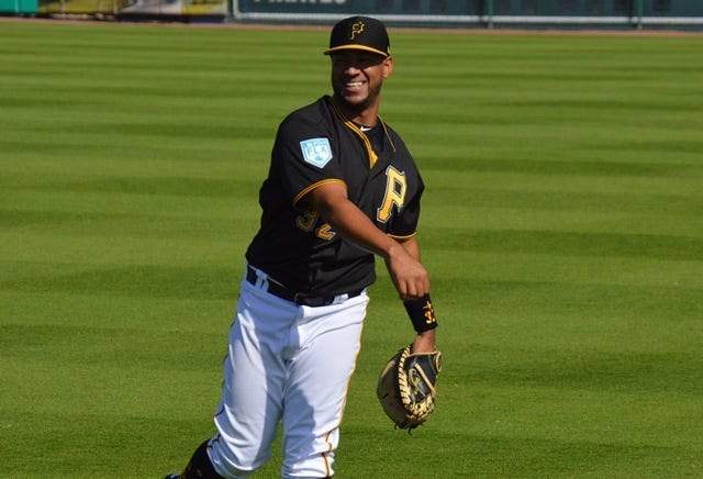 Elias Diaz throwing