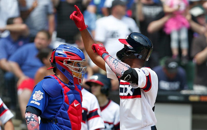 White Sox outfielder Eloy Jimenez celebrates after homering against the Cubs.