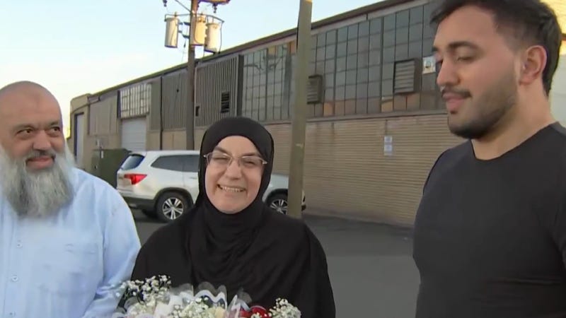 Emine Emanet (center) of Haddon Township was released on Wednesday from an ICE detention center in Elizabeth, New Jersey and reunited with her husband Celal (left) and eldest son Muhammad.