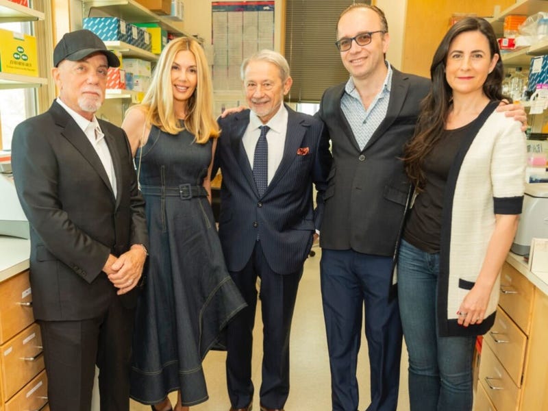 Billy Joel, Alexis Roderick Joel, Dr. Tamer Seckin, Dr. Semir Beyaz and Dr. Piraye Yurttas Beim attend the ribbon-cutting ceremony of the Seckin Endometriosis Research Center for Women’s Health in Cold Spring Harbor.