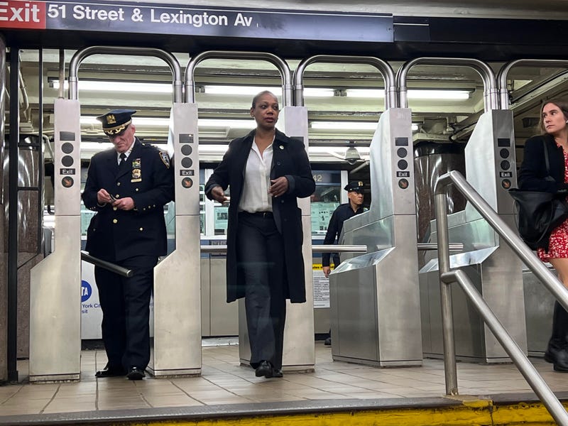 NYPD Commissioner Keechant Sewell enters the subway system at the Lexington Avenue/51st Street station in Midtown with NYPD Transit Chief Jason Wilcox