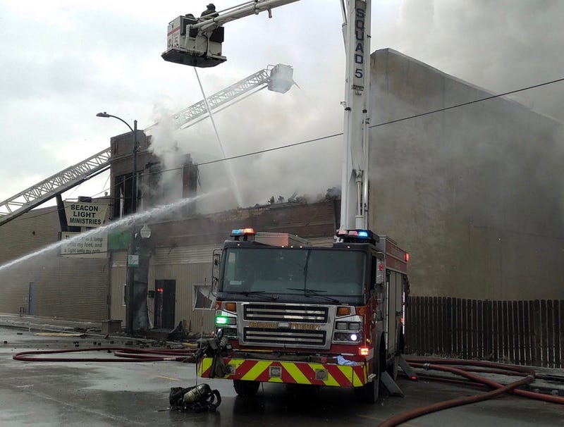 Firefighters work to extinguish a fire Jan. 20, 2020, at 11034 S. Michigan Ave.