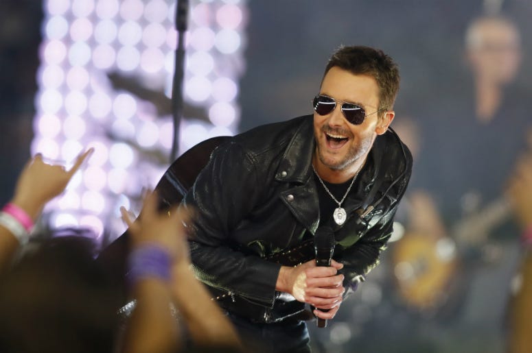 Eric Church performs during the halftime of the game between the Dallas Cowboys and the Washington Redskins at AT&T Stadium. Dallas won 31-26.