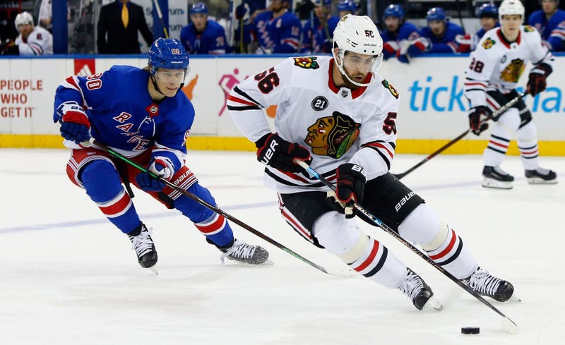 Blackhawks defenseman Erik Gustafsson (56)